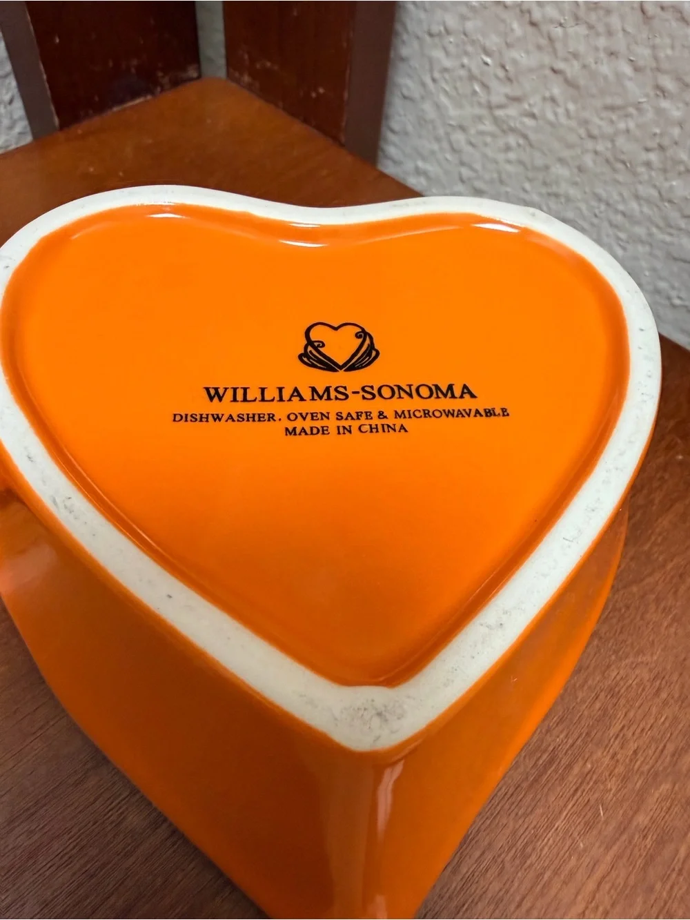 Williams-Sonoma Ceramic Heart-Shaped Dish  Set of 4 in a vibrant glossy orange.